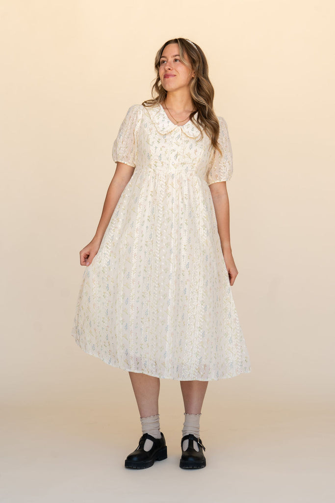 cream floral tea dress Cream FLORAL MIDI DRESS WITH BLUE PANEL DETAIL, BUTTON FRONT AND PUFF SLEEVES Cream / 14